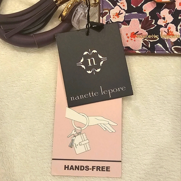 NANETTE LEPORE | "Aly" Hands-free Wristlet Wallet, Plum Blossom with Tassel - Picture 2 of 3